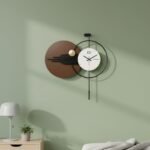Orbit Pendulum Metal Wall Clock